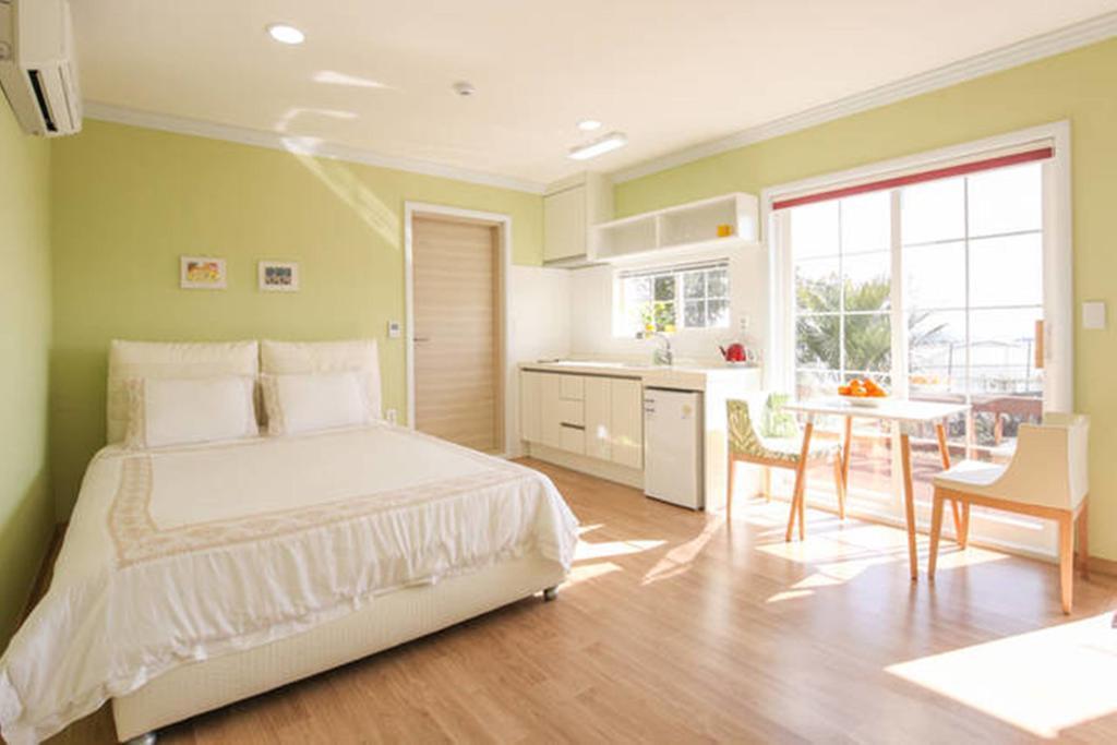 Jubilee Chalet Seogwipo-stad Kamer foto