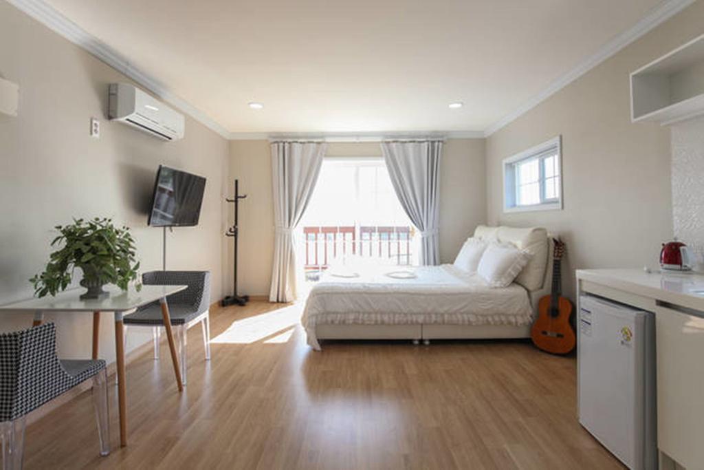 Jubilee Chalet Seogwipo-stad Kamer foto